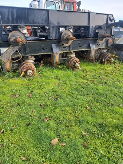 Tri Axle Hendrickson Air ride Suspension from a Dump Trailer . Low mileage , brakes like new , ABS V...