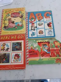 four  vintage children books and nursery rhymes