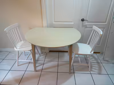 New out of box and assembled dining set that includes: One Ankit Extendable Round Solid Wood Base Di...