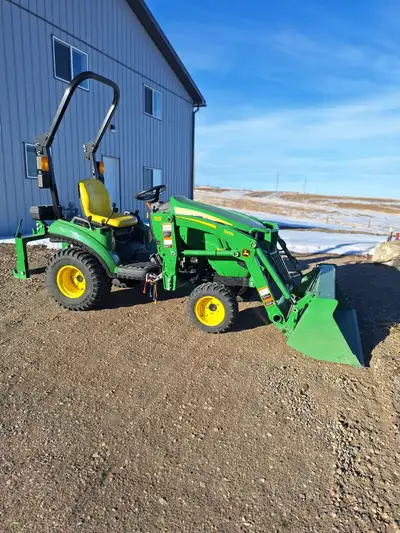 FOR SALE: 2022 John Deere 1023E with Loader. 70 hours, and 3 years warranty remaining. $21,500 OBO -...