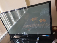 Samsung 50'' plasma flat screen TV + Stand (both for $400)