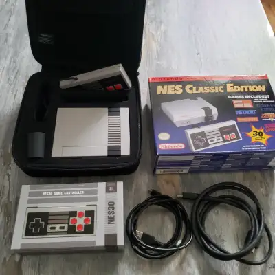 Authentic Nes Classic Edition & 8BitDo Nes30 Remote+CaseThe NES Classic Mini (officially the Nintend...