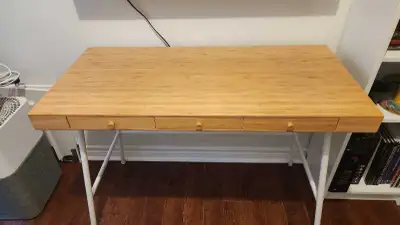 In excellent condition Wood top, metal legs. It measures 29H x 40.25 W x 19.25 D (inches) Pick up on...