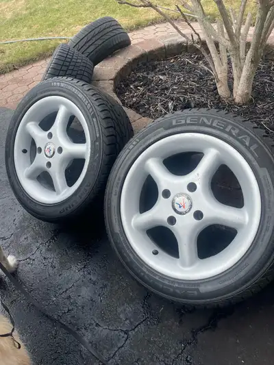 wheels american racing 80 mm hole to hole 115 across hole tire are 205x50 r 15 had on rear 195 x50r...