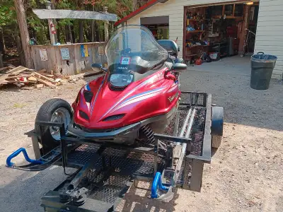 Package deal snowmobile and trailer. This machine is all serviced and ready for the next season. New...
