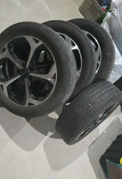 Set Ford Rims with tires approx 50 to 60 percent tread left. Tires Ecopia Bridgestone 225/55R19 4 Fo...