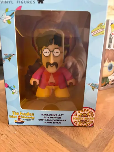 Add a touch of musical nostalgia to your collection with this Beatles Yellow Submarine John Lennon T...