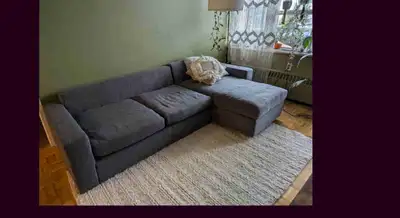 I'm selling a used CB2 sectional sofa with a chaise in good condition. This stylish and comfortable...