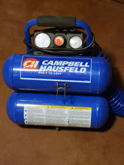 Campbell Hausfeld compressor. Comes with extra air hose. Great for filling up tires.