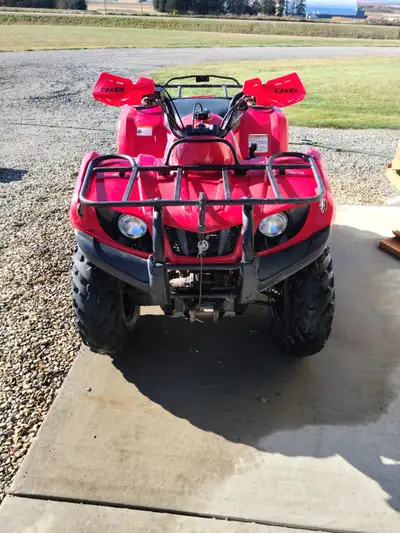 2007 Yamaha ATV 350 in great shape no cracks or tears, hand guards, winch, cargo racks, dif lock, el...