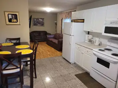 Available NOW This 1 bedroom furnished private suite ( room has a queen bed), super clean windows in...