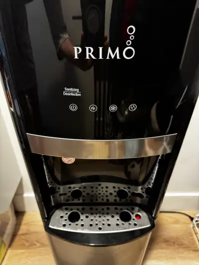 Hot and cold water cooler. Purchased from Walmart for almost $300. Three years old. Good condition....
