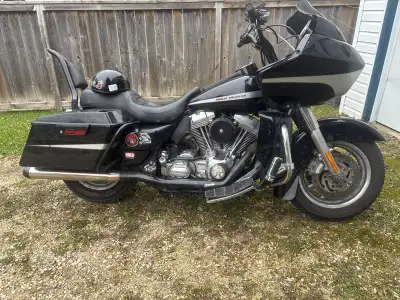 06 roadglide project. 8 inch pull back risers, odi mid bend bars and grips. Rhinehart dual exhaust....