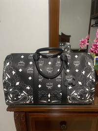 Mcm Duffle Bag with all Original Starps and Authentication Paper