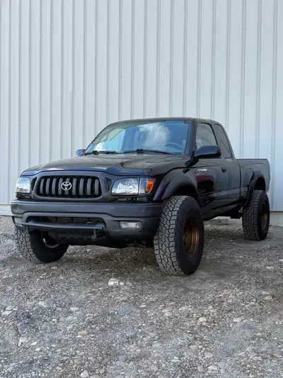 2002 Toyota Tacoma V6 5 Speed 1st Gen Very Desirable!!!! Very strong running and Solid truck for its...