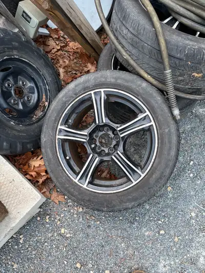 I am selling a set of used aluminum rims and tires, size 205/55R16, that would be great for a second...