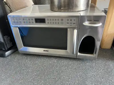 Unique Kenmore Brew Wave all-in-one unit combining a microwave and built-in coffee maker—perfect for...