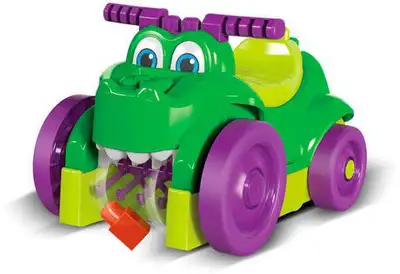 Excellent condition. 3-in-1 fun with a crocodile ride-on, block scooper and building block set! Todd...