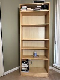 Book shelves with adjustable partition 
