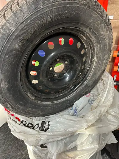 General Tires set of 4 on Steel Rims Grabber Artic - Snow Tire 255/65 R18 115T Used for one season,l...