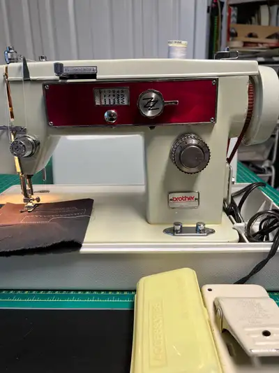This is a vintage Brother sewing machine that sews a straight stitch and zigzag stitch, great for me...