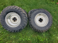 Set of tires and rims off 600 Grizzly