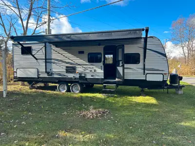 38 ft trailer; Sleeps 10 - 4 bunk beds; 1 queen bed; table folds down; couch folds down; outdoor kit...