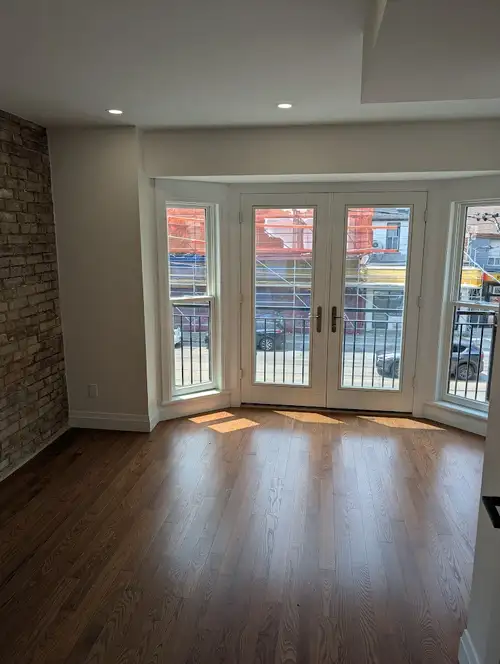 This stunning, modern two-bedroom, two-bathroom apartment in the heart of the Annex features high-en...
