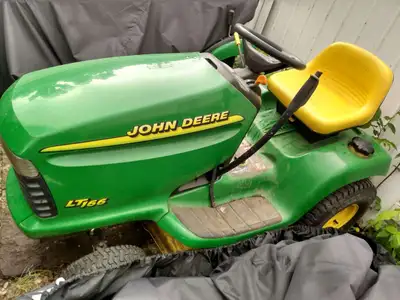 John Deere LT166 lawn tractor STRIPPED FOR PARTS!!, View more