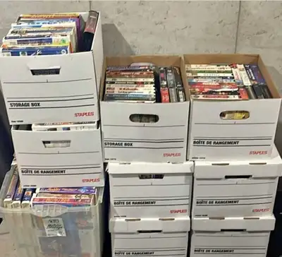 I'm offering a collection of used VHS tapes. These tapes include a variety of movies and shows, perf...