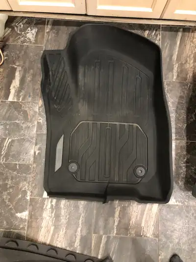 GMC winter mats front and back. They came out of a 2020 Sierra Crew Cab In excellent condition Locat...