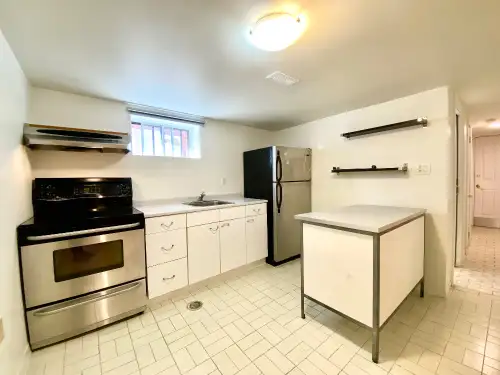 This comfortable 1-bedroom basement apartment offers a functional layout with easy-to-clean tile flo...