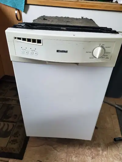 Kenmore dishwasher. Works great. Adjustable legs. 18 inches wide, 23 inches deep, 32 inches height.