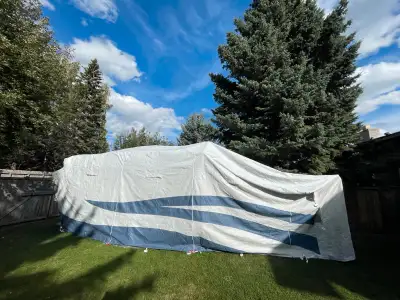 Never used. Stil in box. If you're looking for deal a protective cover for your 26-29' RV - here's a...