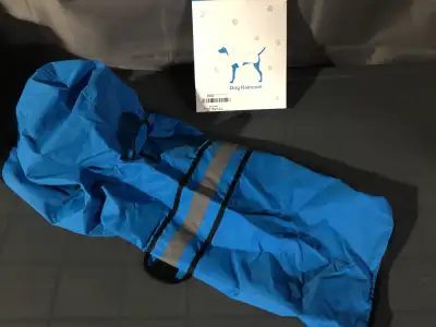 Smallish dog rain coat. New. Asking $10.