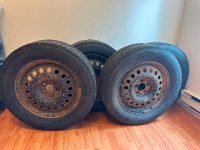 Selling wheels with winter tires 18”