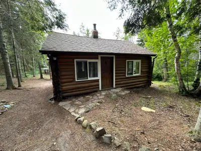 Victoria Beach Charm!! This Classic Cottage has been lovingly maintained and upkept by several gener...