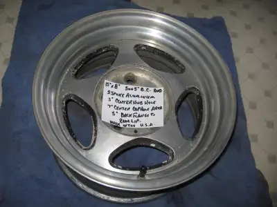 FOR SALE: ONE 15" inch x 8" inch RWD 5 on 5" inch lug pattern, 1/2" inch wheel stud opening, Straigh...