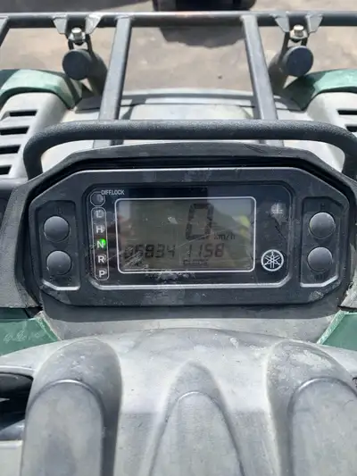 2 Yamaha Kodiaks. Plastic is faded but in good running condition. Minor tear in seats, Km’s in pictu...