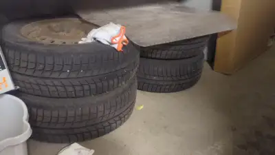 $ 450 (negotiable) - 1 set of 4 used Winter Tires - rim included 195/65/R15