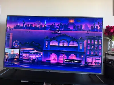 70 Inch Hisense Flat Screen Television, comes with a TV stand for $150