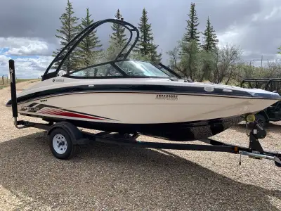 Like new with only 97 hours on it, second owner. New tires and rims. Factory cover in excellent cond...