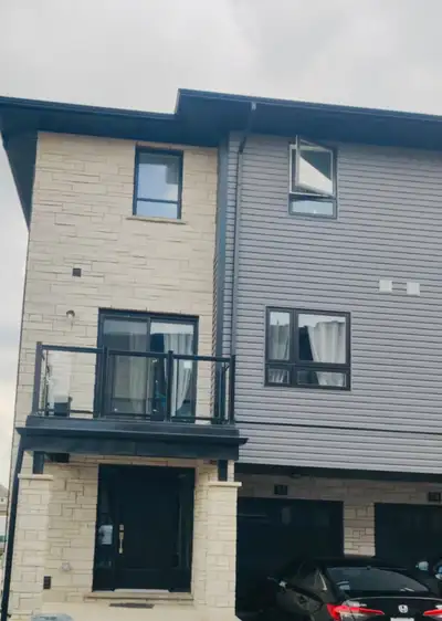 End-unit townhouse with a modern layout featuring 3 bedrooms and 3 bathrooms available for rent. Bri...