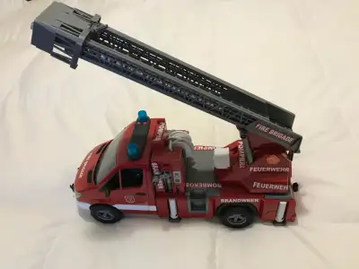 Brandweer fire brigade truck with fireman figurine and extendable ladder. Made in Germany. Indoor an...