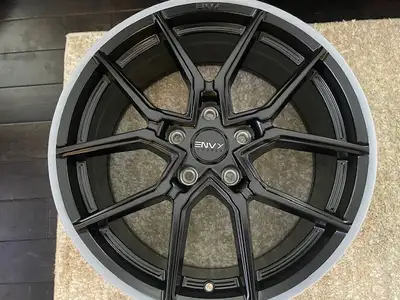 I have a set of brand new black satin Envy RE-5 Rims. These are still in the box. The size is 18 x 8...