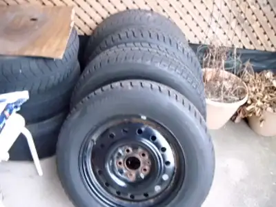 Mounted on newer rims in nice condition. 215/65/16 in. Bolt pattern is 112.0x5 Center bore is 64 . T...