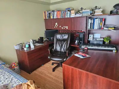 Executive office desk with leather chair. Need some space to put baby stuff. Less than half off the...
