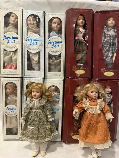 A mixture of porcelain dolls, View more