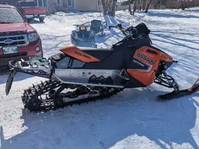 2011 Polaris Switchback Assault 800. Has 144 track, 2 1/4 inch track . Electric start and reverse. A...