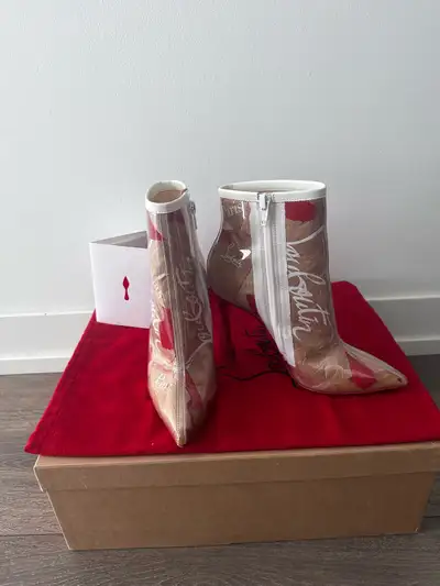Louboutin So Kate PCV Boots, View more